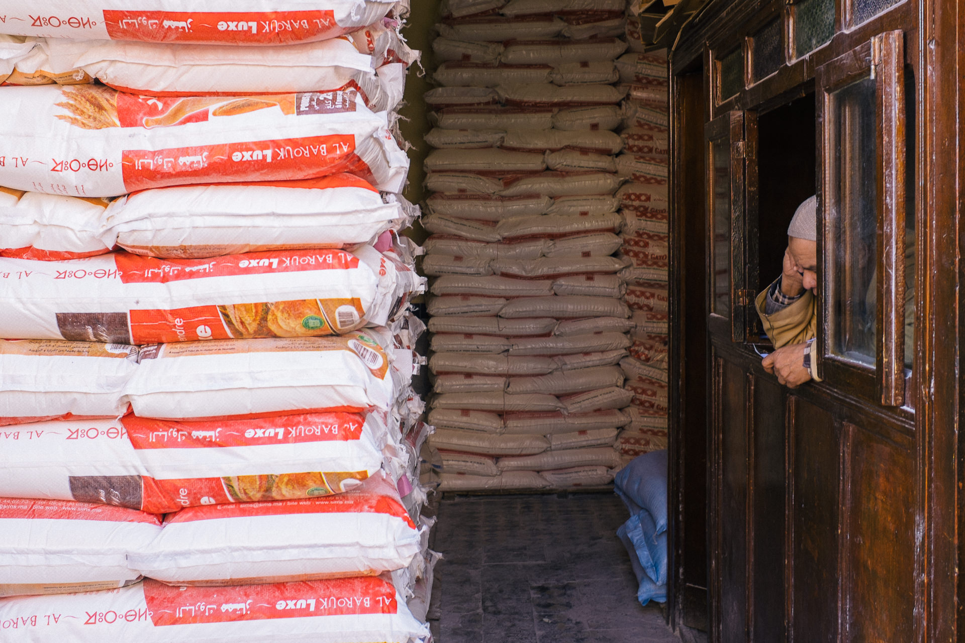 Marrakesh trader on his phone