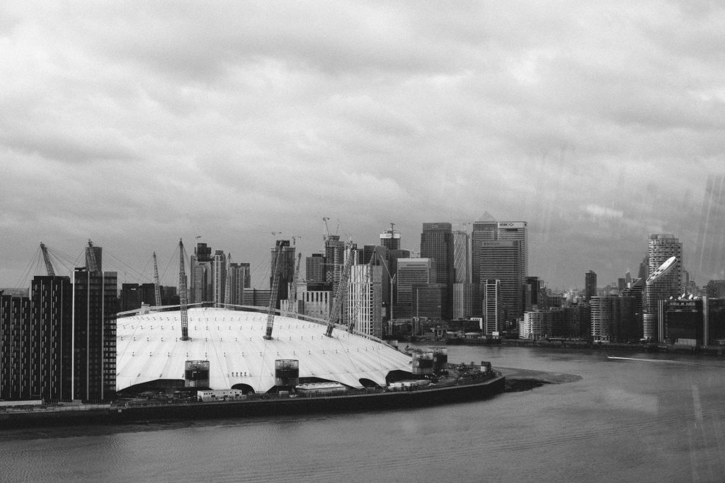 o2 arena london with a canary wharf panorama behind