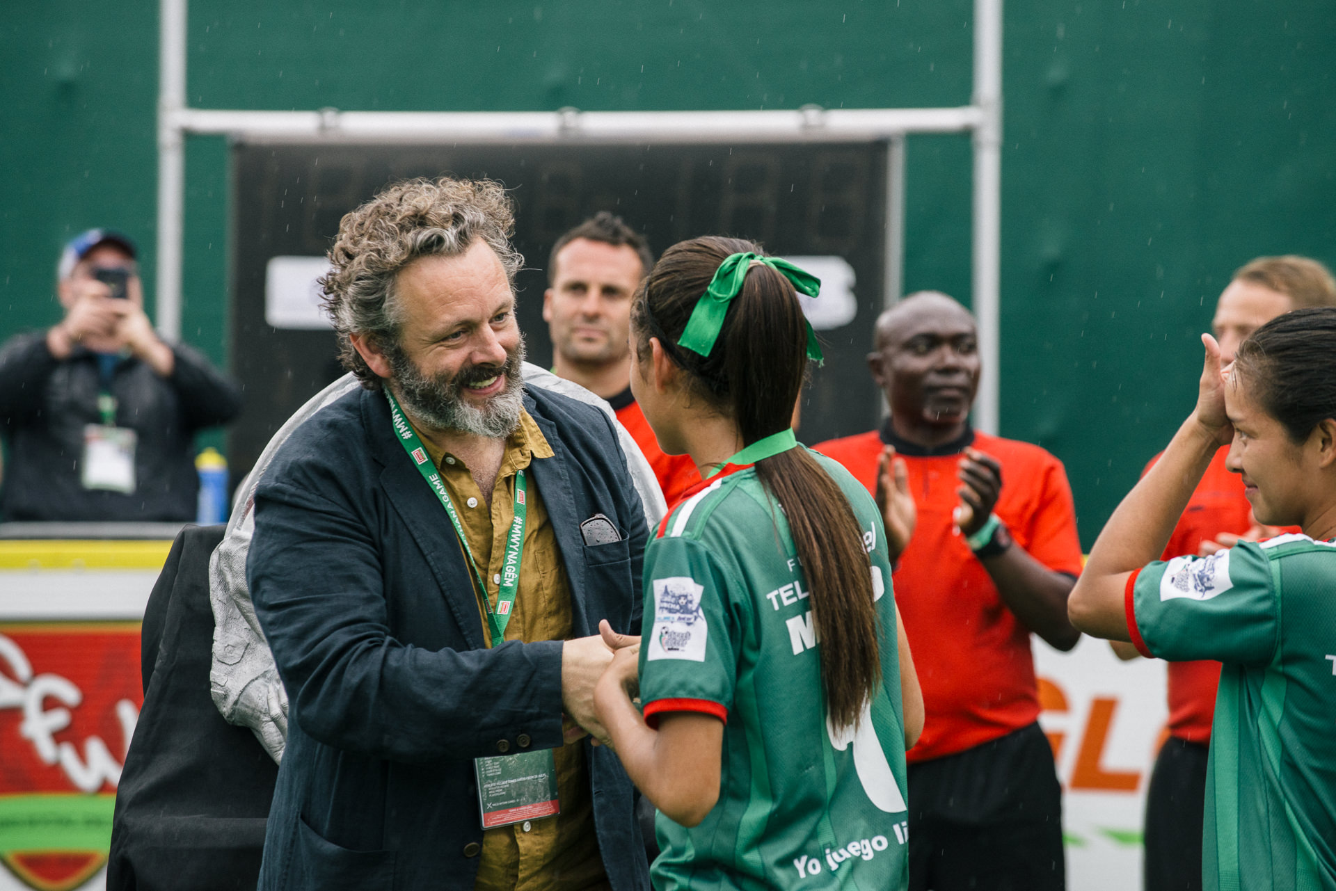 Michael Sheen handing the cardiff2019hwc medals