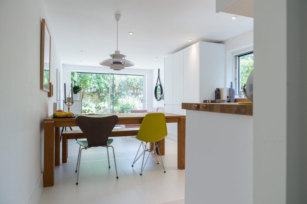 look towards the kitchen from a hallway in a london apartment