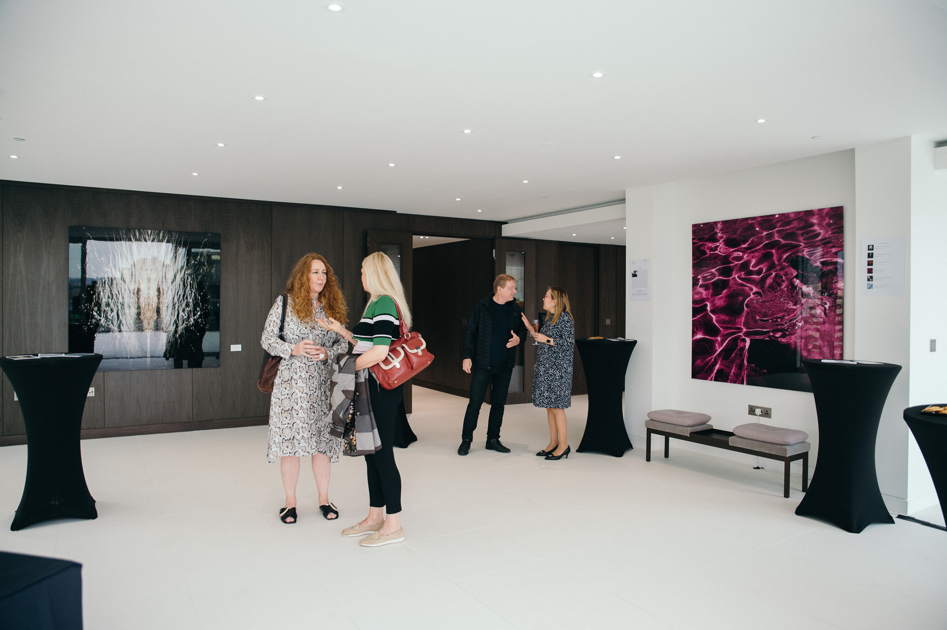 people in vlad loktev gallery during the exhibition