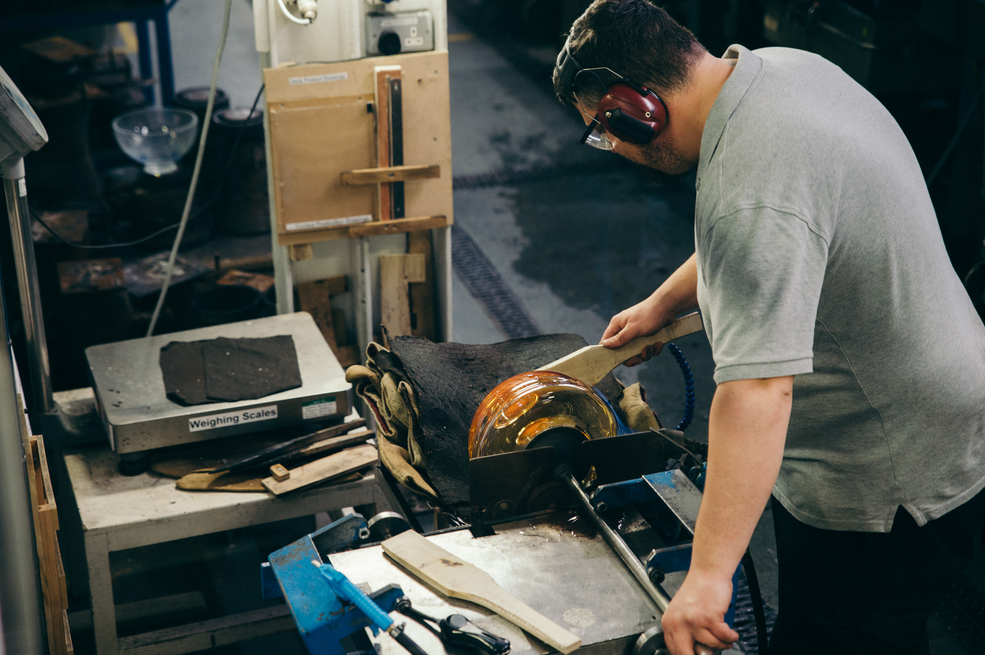 waterford crystal factory worker forms a glass